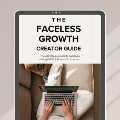 Tablet displaying 'THE FACELESS GROWTH CREATOR GUIDE' over a person typing on a laptop.